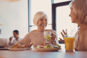 Seniors enjoying themselves at a cafe